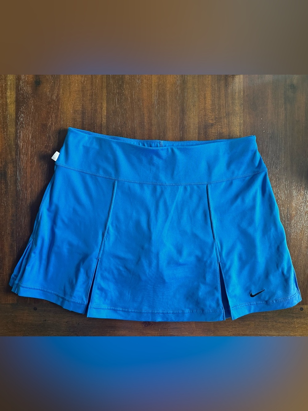 Nike royal Blue tennis Skirt with black Swoosh, size Medium
